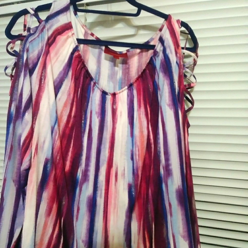Vibrantly colored blouse by Jennifer Lopez